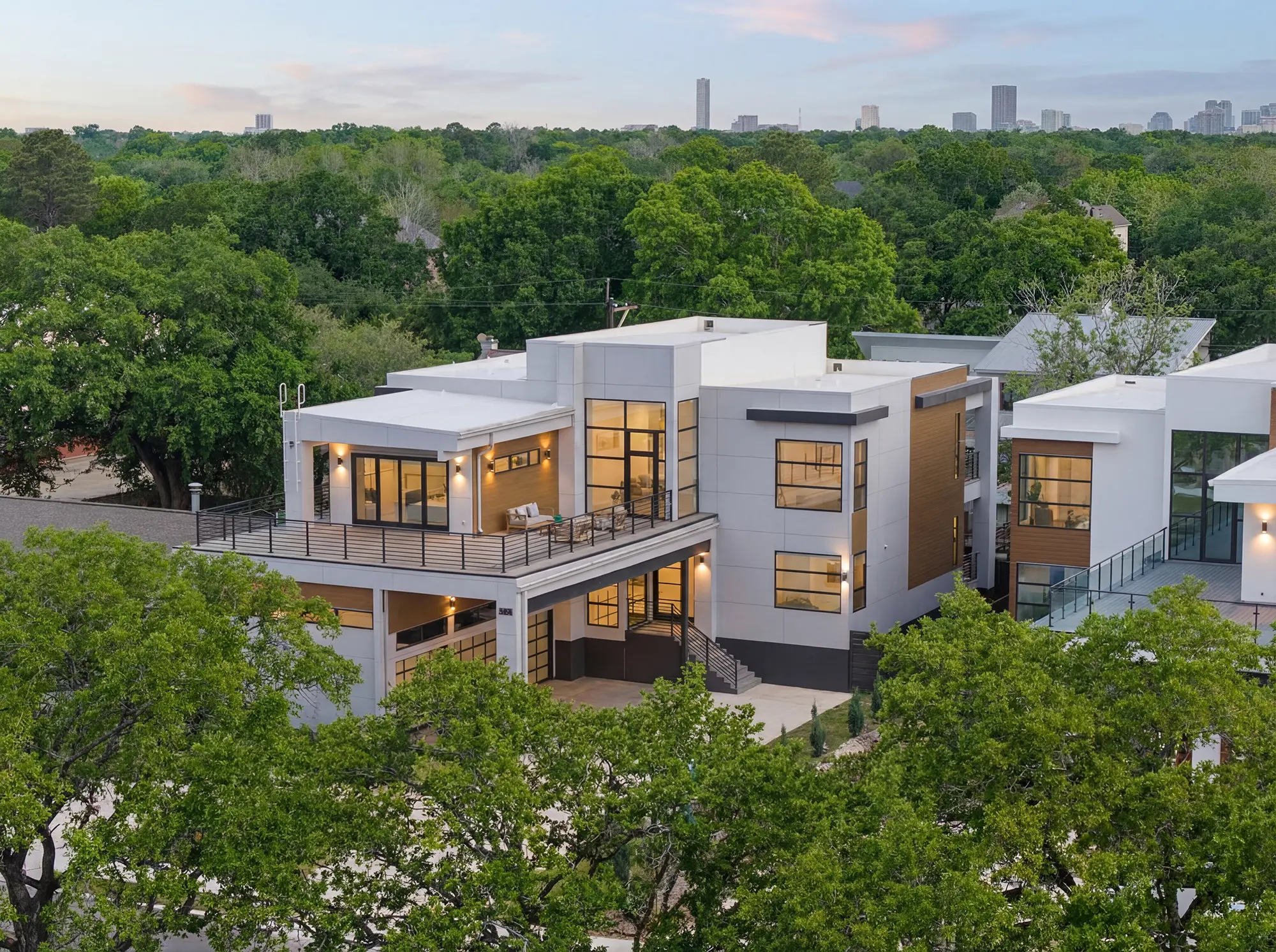 Architecture at dusk against the Houston skyline