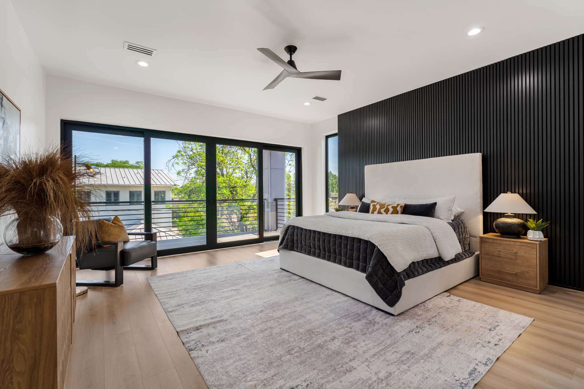 Primary bedroom with oversized glazing