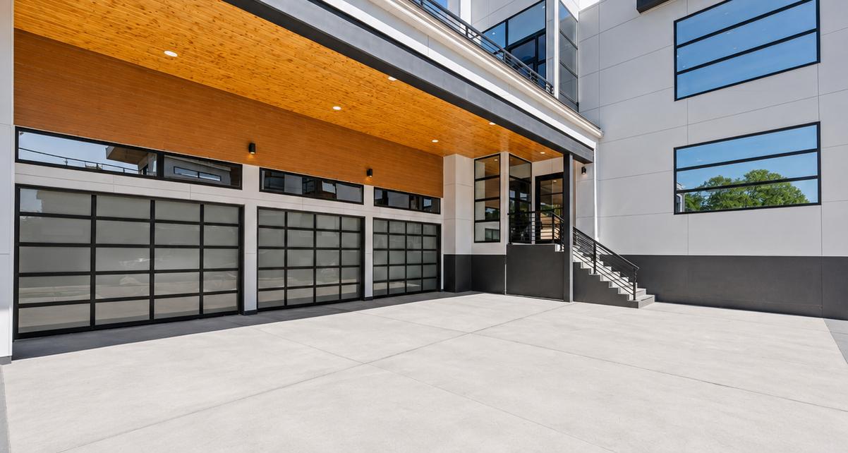 Three-bay garage at street level